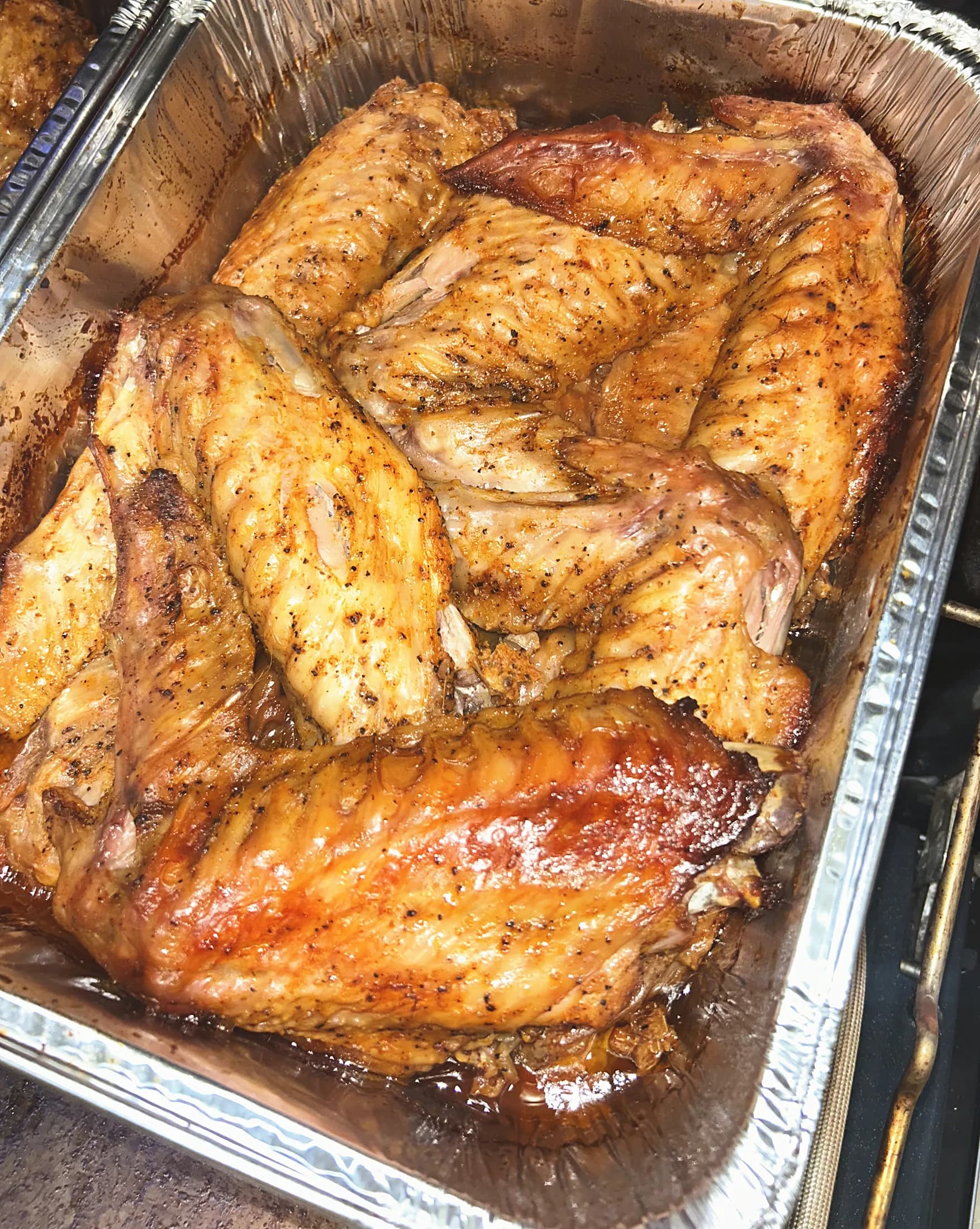 A pan of roasted chicken wings fresh from the oven